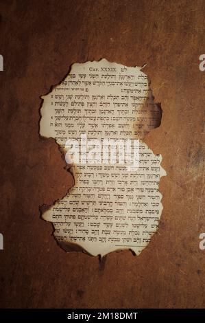 piece of an old page of Jewish book, burnt Stock Photo