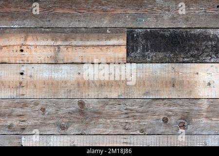 BACKGROUND TEXTURE - Natural wood planks showing differing tones and woodgrain Stock Photo