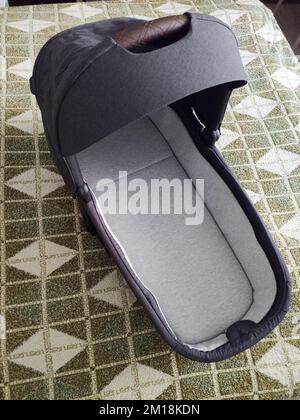 bassinet from a stroller in a separate room Stock Photo