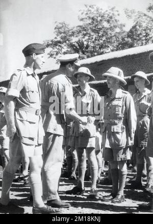 Lord Mountbatten, as Supreme Allied Commander of the South East Asia Command, shaking hands with a pilot whilst meeting RAF in the Burma campaign during the Second World War. Stock Photo