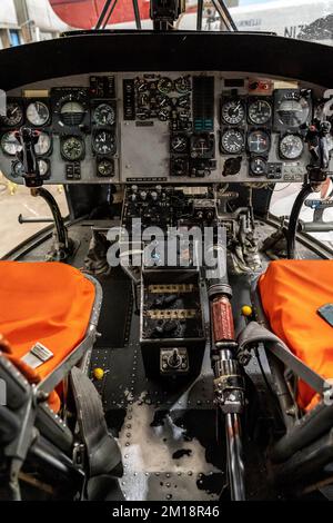 A vertical shot of the cockpit and the instrument panel of the the ...