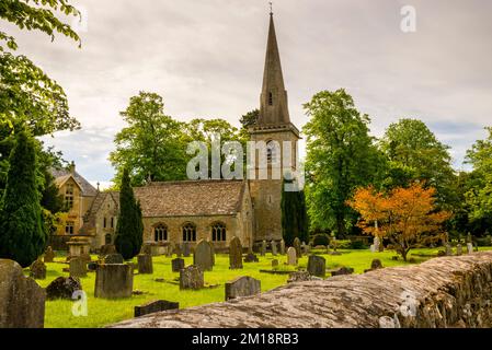 The spire of Church of Saint Mary in the Cotswold village of Lower Slaughter, England. Stock Photo