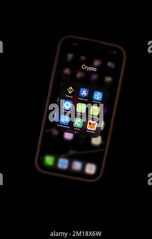 Group of Crypto Wallet and Market Applications on Apple iPhone Stock Photo