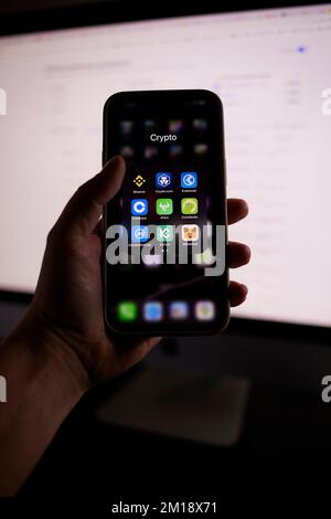Group of Crypto Wallet and Market Applications on Apple iPhone Stock Photo