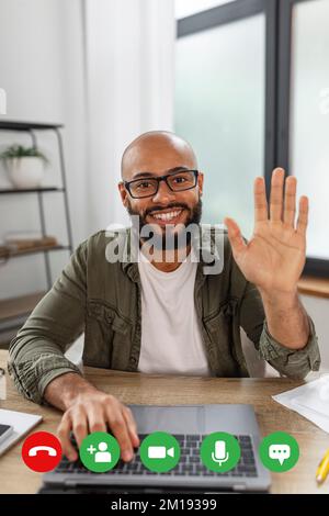 Web conference concept. Happy latin man making video call via laptop and waving to webcamera, screenshot view Stock Photo