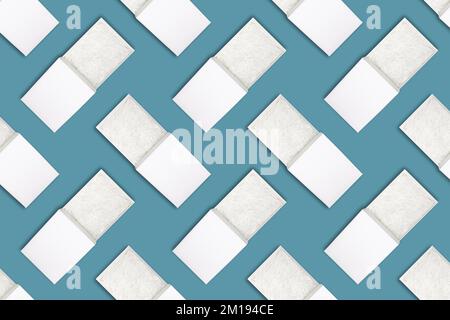 Seamless pattern with Opened gift boxes with shredded paper on blue background. White paper box with decorative straws fillers for your product placem Stock Photo