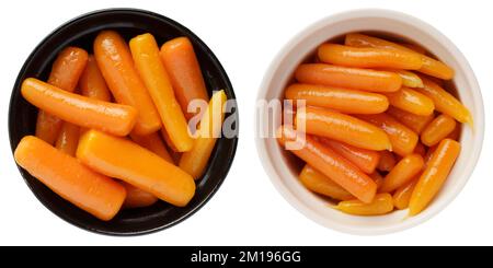 Boiled canned carrots in a bowl isolated on white background. View from above Stock Photo