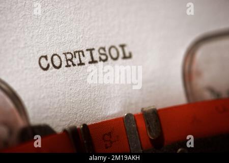 Cortisol word written with a typewriter. Stock Photo