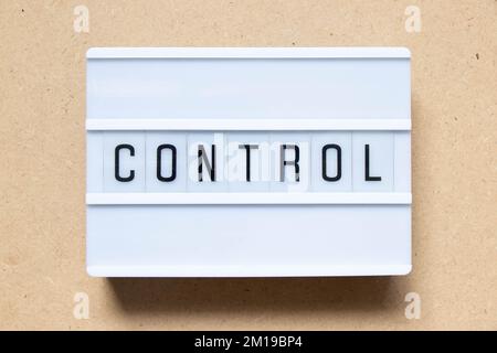 Lightbox with word control on wood background Stock Photo