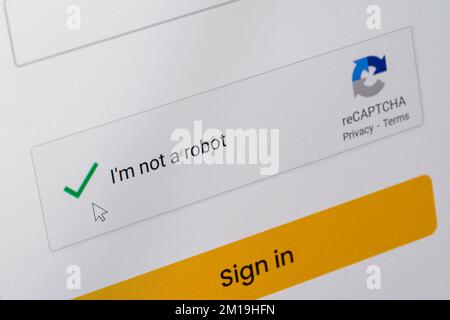 A reCAPTCHA verification on a website requiring the user to show that they're human and not a robot trying to spam or automate data extraction Stock Photo