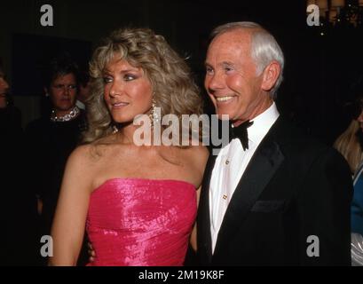 Johnny Carson and Alexis Maas at the American Cinematheque Moving Picture Ball on May 6, 1988. Credit: Ralph Dominguez/MediaPunch Stock Photo