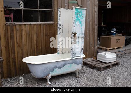 Vintage Shower and Bath at a Salvage Yard at Newton in Cartmel, in the English Lake District Stock Photo