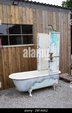 Vintage Shower and Bath at a Salvage Yard at Newton in Cartmel, in the English Lake District Stock Photo