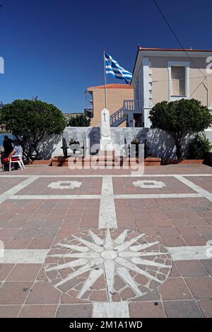 Decorative terrace and war memorial with canons and Greek flag, Petra, Lesbos. Taken September / October 2022. Stock Photo