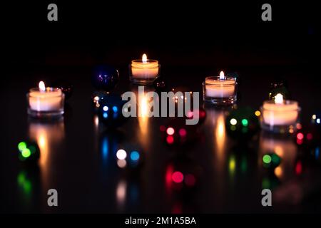 Focus on background with blurry baubles Stock Photo
