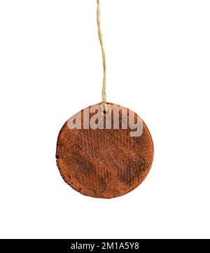 Solid sealing wax, retro vintage stamp hanging on string, rope isolated on white background. High quality photo Stock Photo