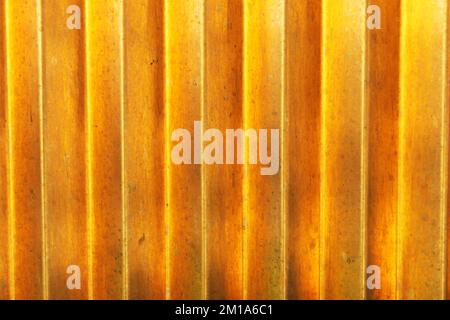 Straight line textured bright yellow wall Stock Photo
