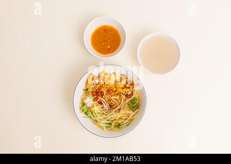 Com hen, Vietnamese rice dish with baby basket clams rice, Vietnamese food isolated on white background, top view Stock Photo