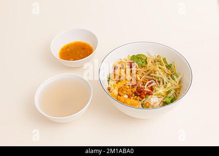 Com hen, Vietnamese rice dish with baby basket clams rice, Vietnamese food isolated on white background, perspective view Stock Photo