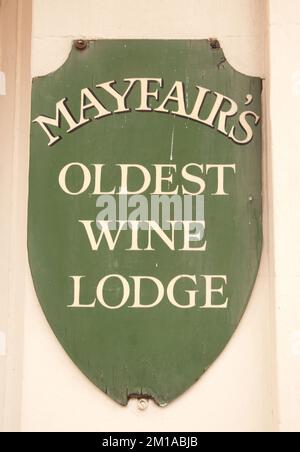 Sign for Mayfair's Oldest Wine Lodge, Trebeck Street, Shepherd Market, Mayfair, Westminster, London, UK Stock Photo