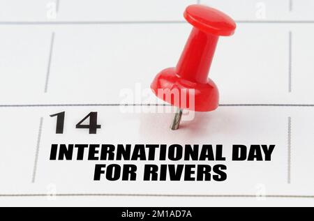 Holidays. On the calendar grid, the date and name of the holiday - International Day Rivers Stock Photo