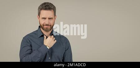 Casual appearance without having to don a tie. Bearded man wear shirt. Wearing smart casual. Man face portrait, banner with copy space. Stock Photo