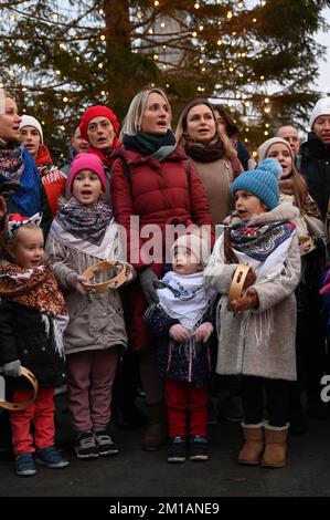 London, United Kingdom. 11th December 2022: The Ukrainian Cathedral Choir for the British Ukrainian Aid - Ukraine Fundraiser with beautiful people singing in Ukrainian and English carols performed under the Christmas tree at Trafalgar Square. Credit: See Li/Picture Capital/Alamy Live News Stock Photo