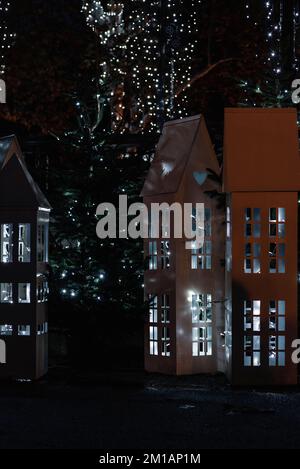 Christmas decorations in city park at night. Stock Photo