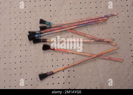 Paint brushes on technique ebru art on paper background Stock Photo
