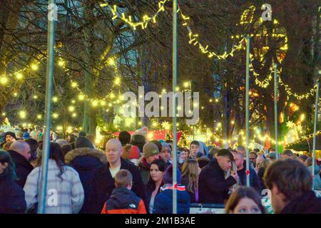 Edinburgh, Scotland, UK 11h December, 2022.  Night time Christmas fairs in Edinburgh saw tourists and locals crowd the attractions. The fair at the base of the castle beside the fountain is a hidden gem Credit Gerard Ferry/Alamy Live News Stock Photo