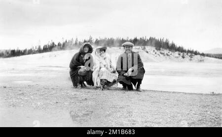 EDITH STAYART ANN LITTLE and LEONARD CLAPHAM (later TOM LONDON) on set location candid during filming in Yellowstone National Park of the lost 15 Chapter Silent Serial NAN OF THE NORTH 1922 director DUKE WORNE writer Karl R. Coolidge Arrow Film Corporation Stock Photo