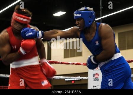 Lubbock, TX, USA. 10th Dec, 2022. Action between ALI FELIZ (red) of Bethel, CT and PRYCE TAYLOR (blue) of Brooklyn in the championship bout of the Elite Male Super Heavyweight (203 pounds and over) division. Feliz was declared the victor by decision. (Credit Image: © Adam DelGiudice/ZUMA Press Wire) Stock Photo