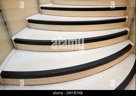 indoor curved steps leading upwards Stock Photo