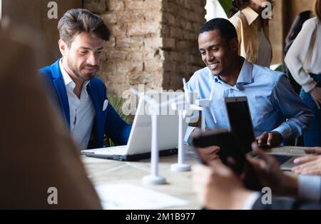 Professional wind engineers studyind a new innovative energy project - Sustainability and green energy lifestyle concept Stock Photo