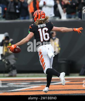 Cincinnati Bengals wide receiver Trenton Irwin (16) makes a catch for a  touchdown during an NFL football game against the Cleveland Browns,  Tuesday, Dec. 13, 2022, in Cincinnati. (AP Photo/Jeff Dean Stock