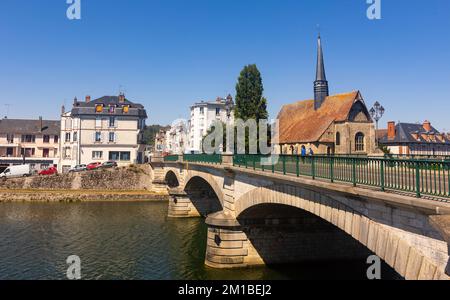Church of Saint-Maurice and arched bridge across Yonne river in Sens town Stock Photo