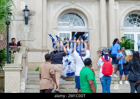 NEW ORLEANS, LA, USA - SEPTEMBER 3, 2022: Revelers on the steps of Willow School after the renaming dedication of the school Stock Photo