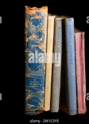 NEW ORLEANS, LA, USA - DECEMBER 8, 2022: Vintage copies of famous works of English and French literature on a black background Stock Photo