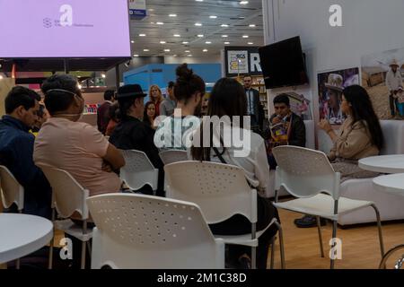 Speaker giving a talk on corporate business conference. Unrecognizable people in audience Stock Photo