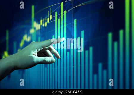 Businessman touching forex charts and diagrams stock market display on board. Stock Photo
