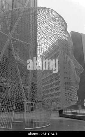 Calgary, Alberta / Canada - December 27 2022: Wonderland Sculpture by Jaume Plensa under the snow Stock Photo