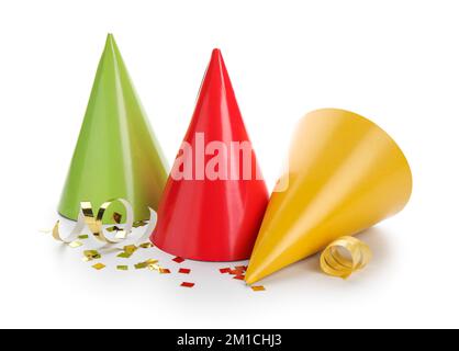 Colorful party hats with confetti on white background Stock Photo