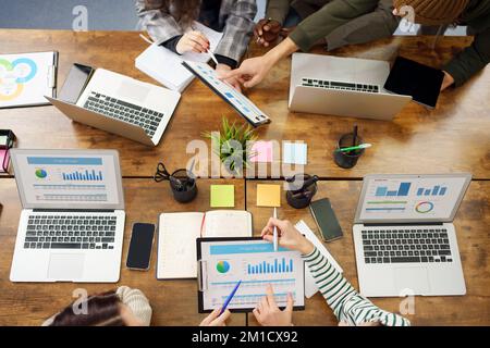 business team analyzing financial data . concept of teamwork. Stock Photo