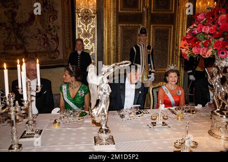 Crown Princess Victoria and Queen Silvia attend the King's dinner for the Nobel laureates at the Royal Palace in Stockholm, Sweden, 11 December 2022. Stock Photo