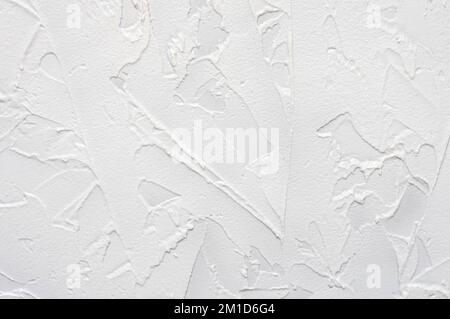 Rough plastered wall. White background of cement. Concrete wall texture. Close up. Stock Photo