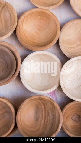 Empty bowls made of wood of brown color Stock Photo