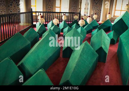 Rows of coffins in an ottoman turkish mausoleum tomb Stock Photo