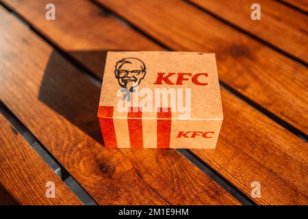 Krakow, Poland - September 11 2022: Box of KFC Fried Chicken and Chili and Ketchup Sauce Stock Photo