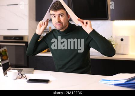 Stressed out working in home office Stock Photo