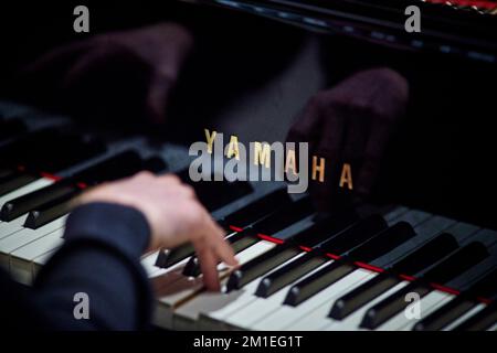 Yamaha Piano Pianist plying music keys Stock Photo